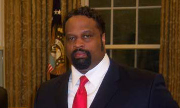 Derrick M. Holmes - CEO