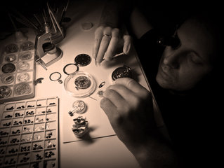 Maxim Nazarov is assembling watch in his workshop