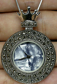 watch with mother-of-pearl dial