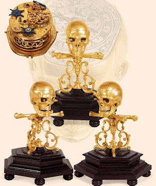 mechanical watches with smiling skull and animated snakes in their sockets