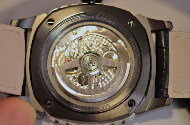  Peripheral Double Rotor by Perrelet in a gold case.