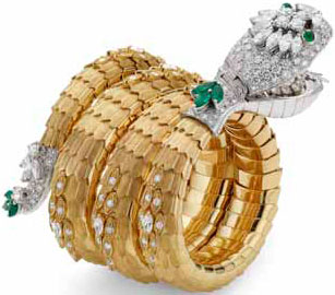 watch-bracelet Serpenti in yellow gold and platinum inlaid with diamonds and emeralds from the Bulgari Heritage 1967 collection