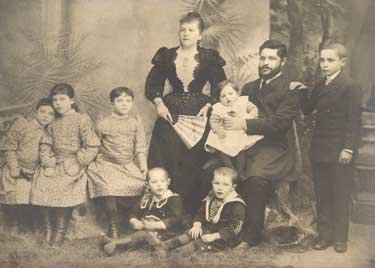 This family photo was taken in 1892. Hersh Wein is seated and on his lap is Morris Wein at approximately one year old.
